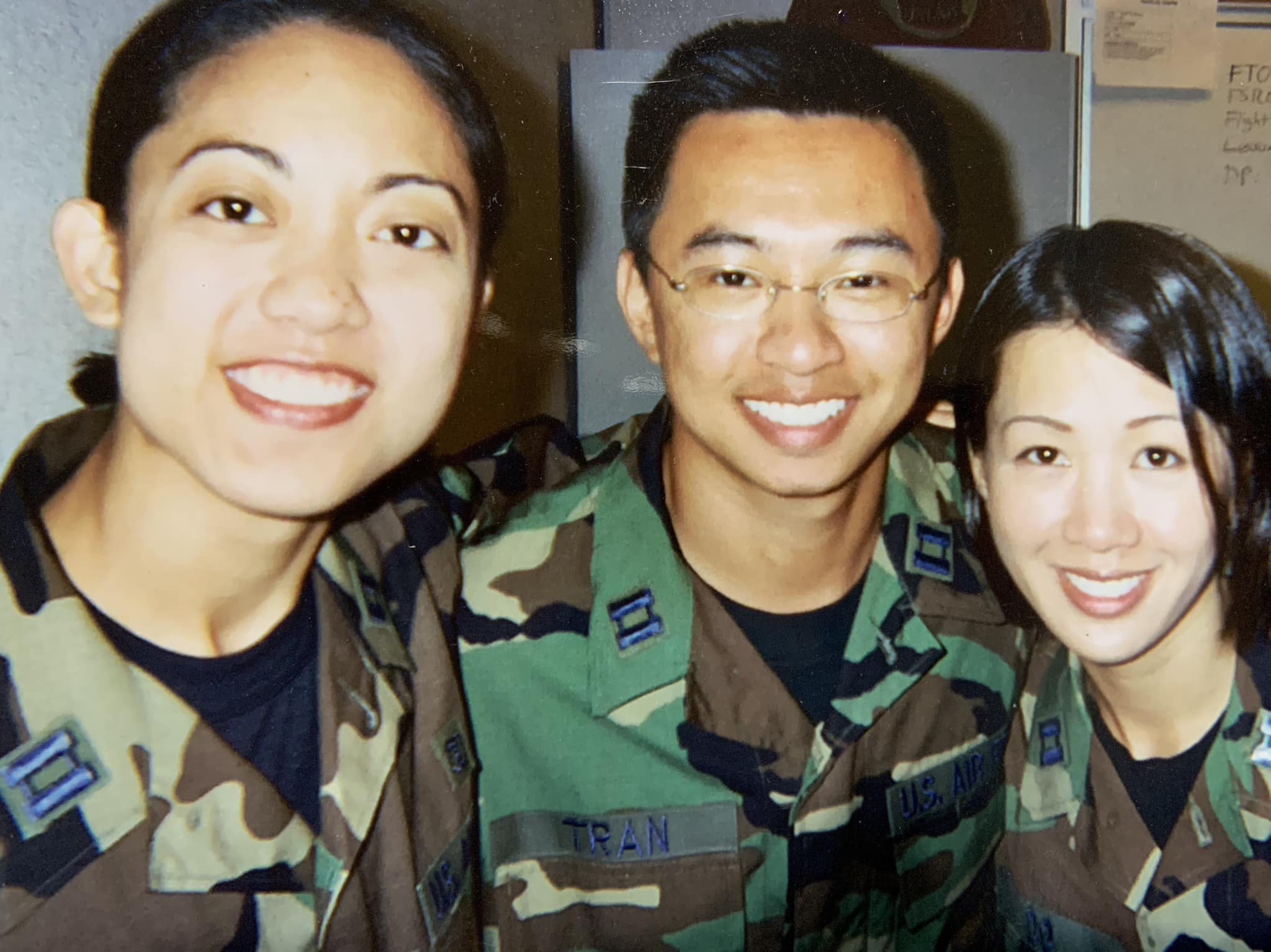 Image of Group photo of three people smiling
